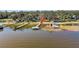 Aerial view of waterfront property with private dock and access to the lake at 12854 Se 118Th Ter, Ocklawaha, FL 32179
