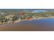 Wide aerial showcasing waterfront property and dock at 12854 Se 118Th Ter, Ocklawaha, FL 32179