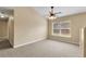 Large bedroom with neutral walls and carpeted floor at 12854 Se 118Th Ter, Ocklawaha, FL 32179