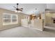 Open concept living area with kitchen views and breakfast bar at 12854 Se 118Th Ter, Ocklawaha, FL 32179