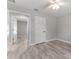 Bright bedroom with ceiling fan and wood-look floors at 1302 Ne 22Nd Ave, Ocala, FL 34470