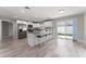Modern kitchen with white cabinets and granite countertops at 1302 Ne 22Nd Ave, Ocala, FL 34470