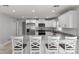 Modern kitchen with stainless steel appliances and granite island at 1302 Ne 22Nd Ave, Ocala, FL 34470