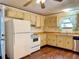 Kitchen boasting light wood cabinets and a view to outside at 14497 Ne 189Th Pl, Fort Mc Coy, FL 32134