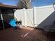 Small backyard patio with white vinyl fence, potted plants, and a pool at 15083 Sw 43Rd Terrace Rd, Ocala, FL 34473