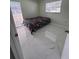 Bedroom with floral bedding and tile floors at 15083 Sw 43Rd Terrace Rd, Ocala, FL 34473