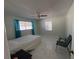 Bedroom with a ceiling fan and tile floors at 15083 Sw 43Rd Terrace Rd, Ocala, FL 34473