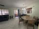 Dining area with table and chairs, view to backyard at 15083 Sw 43Rd Terrace Rd, Ocala, FL 34473