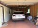 Attached garage with space for one car and additional storage at 15083 Sw 43Rd Terrace Rd, Ocala, FL 34473