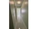 Hallway with light green walls and tile floors at 15083 Sw 43Rd Terrace Rd, Ocala, FL 34473