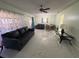 Bright living room features tile floors, comfortable seating and dining area at 15083 Sw 43Rd Terrace Rd, Ocala, FL 34473