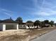 Street view showcasing a mix of houses, some under construction at 15083 Sw 43Rd Terrace Rd, Ocala, FL 34473