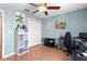 Bedroom with ample storage and a dedicated workspace at 15391 Se 90Th Ct, Summerfield, FL 34491
