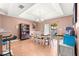 Dining area with table, chairs, and access to kitchen at 15391 Se 90Th Ct, Summerfield, FL 34491