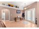 Spacious entryway with tiled floor and access to other rooms at 15391 Se 90Th Ct, Summerfield, FL 34491