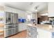 Modern kitchen with stainless steel appliances and granite countertops at 15391 Se 90Th Ct, Summerfield, FL 34491