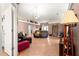 Spacious living room with multiple seating areas at 15391 Se 90Th Ct, Summerfield, FL 34491