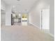 Open concept living area with kitchen and stainless steel appliances at 15982 Sw 30 Ln, Ocala, FL 34481