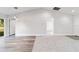 Open concept living area with kitchen and stainless steel appliances at 15982 Sw 30 Ln, Ocala, FL 34481