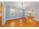 Cozy dining room featuring beautiful hardwood floors and soft blue wall colors at 18 Se 14Th Ave, Ocala, FL 34471