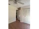 Bedroom featuring wood-look floors and closet at 1804 Sw 29Th Ter, Ocala, FL 34474