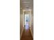 Hallway with wood flooring at 1804 Sw 29Th Ter, Ocala, FL 34474