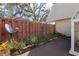 Backyard featuring a patio area, privacy fence, and sunroom at 2145 Ne 45Th Ave # 2145, Ocala, FL 34470