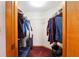 Well-organized walk-in closet with ample storage space and clothing racks at 2145 Ne 45Th Ave # 2145, Ocala, FL 34470