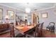 A dining room that features wood table, chandelier, and unique decor accents at 2145 Ne 45Th Ave # 2145, Ocala, FL 34470