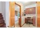 View of the laundry room with washer, dryer, and built-in desk area at 2145 Ne 45Th Ave # 2145, Ocala, FL 34470