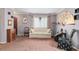 Living room features a couch, and unique decor accents at 2145 Ne 45Th Ave # 2145, Ocala, FL 34470