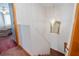 Carpeted staircase leading to the upper level, seamlessly connecting to a hallway and nearby bedroom at 2145 Ne 45Th Ave # 2145, Ocala, FL 34470