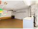 Garage with washer, dryer, and ample storage shelving at 2321 Se 19Th Cir, Ocala, FL 34471