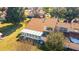 Back of house, showing a sunroom and backyard at 2321 Se 19Th Cir, Ocala, FL 34471