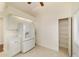 White kitchen with ample cabinet space and pantry at 2321 Se 19Th Cir, Ocala, FL 34471