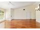 Bright living room with hardwood floors, vaulted ceiling and fireplace at 2321 Se 19Th Cir, Ocala, FL 34471