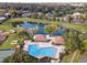 Community pool with surrounding lounge area at 2321 Se 19Th Cir, Ocala, FL 34471