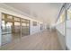 Spacious sunroom with sliding glass doors and light flooring at 2321 Se 19Th Cir, Ocala, FL 34471