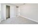 Bedroom with closet and access to another room at 24025 Nw Foxglove Lane, Dunnellon, FL 34431