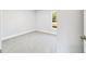 Simple bedroom with grey carpet and a window at 24025 Nw Foxglove Lane, Dunnellon, FL 34431