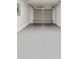 Garage with painted floor and an automatic door at 24025 Nw Foxglove Lane, Dunnellon, FL 34431
