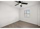 Bright bedroom with ceiling fan and wood-look floor at 26 Spring Cir, Ocala, FL 34472