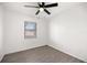 Light and airy bedroom with neutral paint and laminate flooring at 26 Spring Cir, Ocala, FL 34472