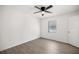 Bright bedroom with ceiling fan and wood-look floor at 26 Spring Cir, Ocala, FL 34472