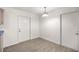 Dining area with wood-look floors and a door to the exterior at 26 Spring Cir, Ocala, FL 34472