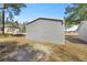 Large metal storage shed in the backyard at 26 Spring Cir, Ocala, FL 34472