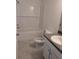 Bathroom with a shower/tub combo, tile flooring and a vanity at 316 Nw Narcissus Rd, Dunnellon, FL 34431