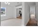 Open-concept dining room with hardwood floors and view to kitchen at 3212 Ne 46Th Ave, Ocala, FL 34470