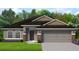 Charming single-story home with a gray exterior, stone accents, and a well-manicured front yard at 3212 Ne 46Th Ave, Ocala, FL 34470