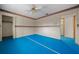 Bright bedroom featuring blue carpet and ample closet space at 4301 Se 38Th St, Ocala, FL 34480